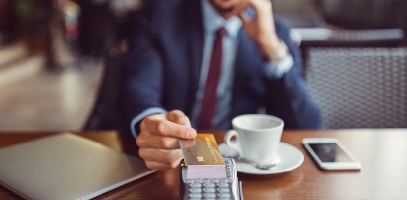 Businessman making contactless payment with credit card credit card sales